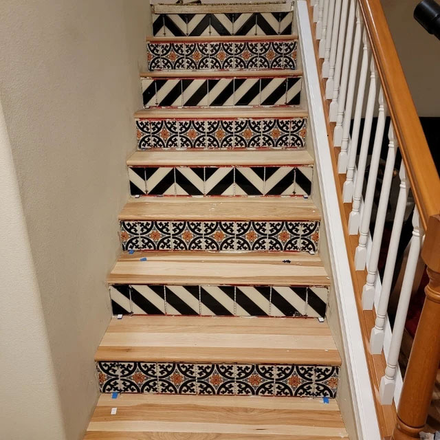 Strip and floral deco tile stair risers