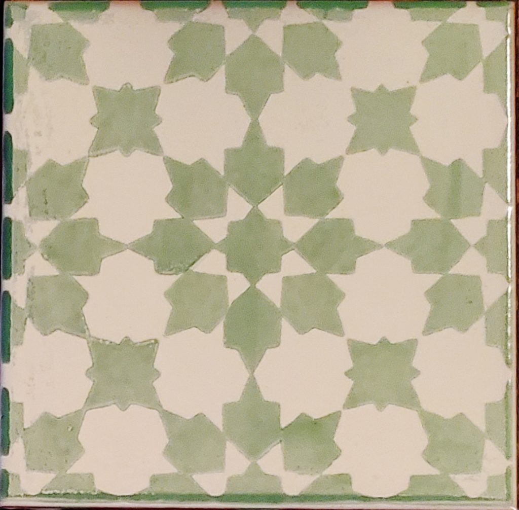 Arabesques green and offwhite pattern Myolica style